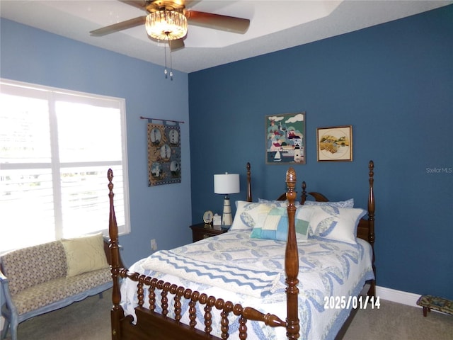 bedroom with ceiling fan and carpet