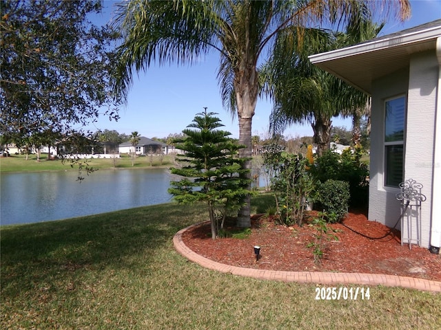 view of yard with a water view