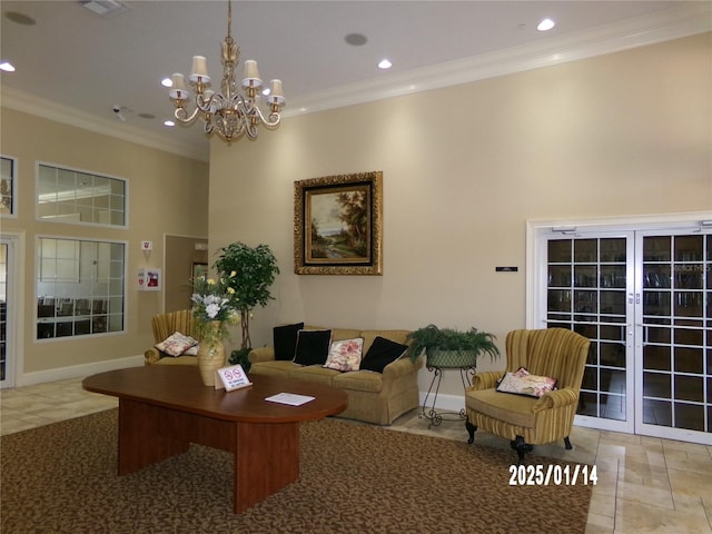 living room featuring french doors and crown molding