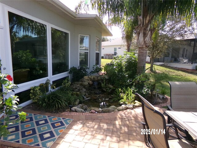 10173 Julia Isles Ave, Oxford, FL 34484 - view of patio / terrace