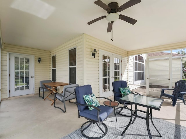 view of patio featuring ceiling fan and french doors