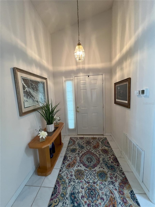 entryway featuring a high ceiling