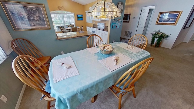 view of carpeted dining room