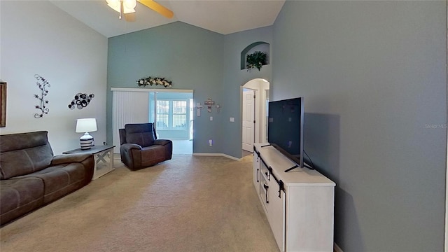 living room featuring ceiling fan, light carpet, and high vaulted ceiling