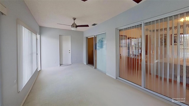 spare room featuring ceiling fan