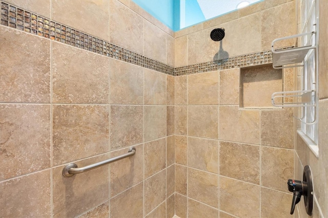 details featuring a tile shower