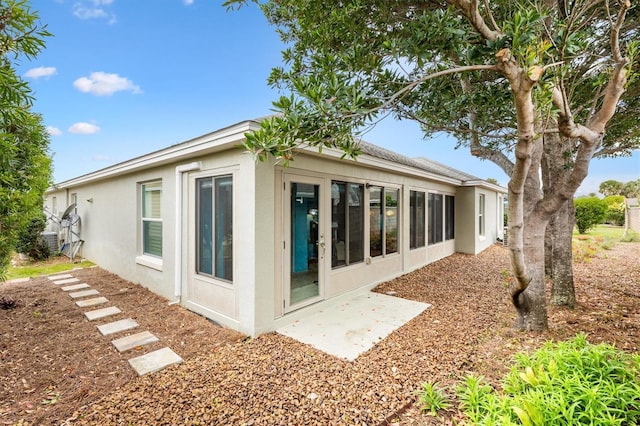 exterior space featuring stucco siding