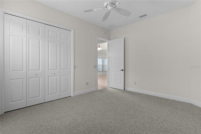 2935 Cedar Grove Loop, The Villages, FL 32163 - unfurnished bedroom with carpet floors, a closet, and ceiling fan