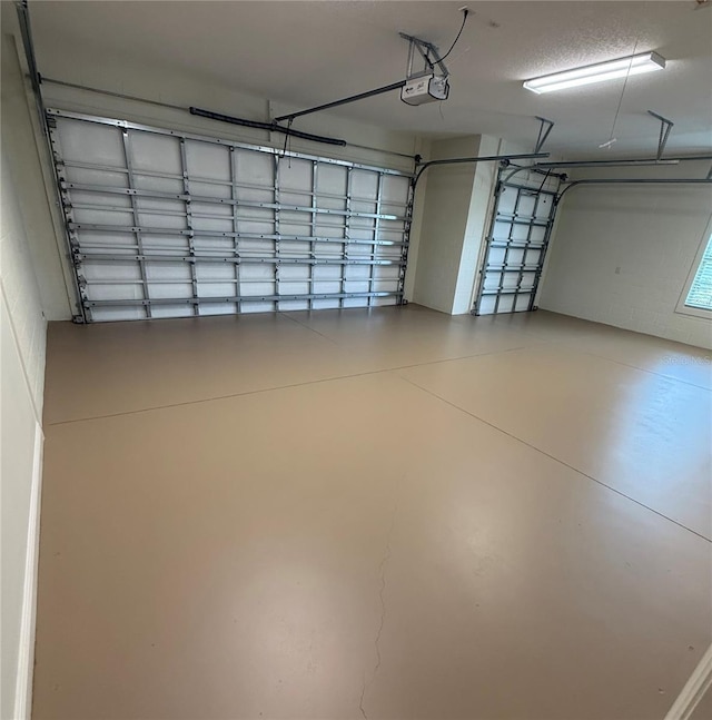 2935 Cedar Grove Loop, The Villages, FL 32163 - garage featuring a garage door opener