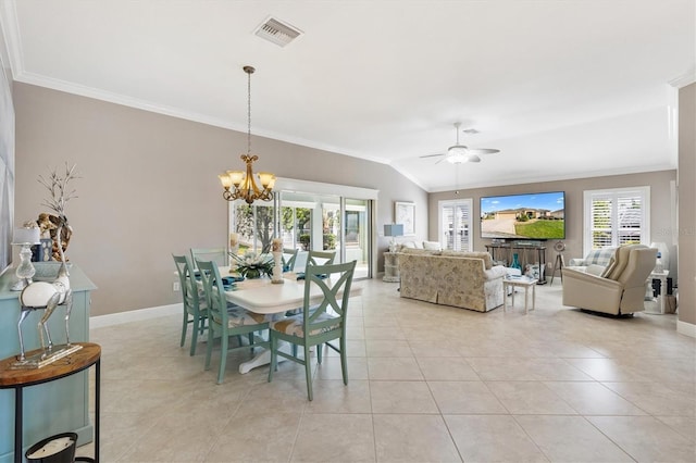 dining room featuring ornamental molding, visible vents, baseboards, light tile patterned floors, and lofted ceiling