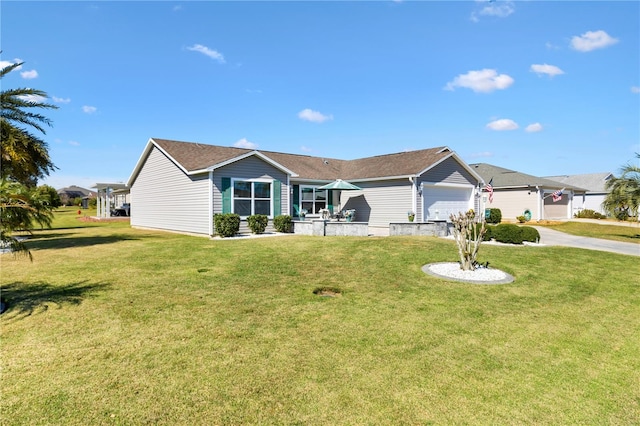 ranch-style house with a garage and a front yard