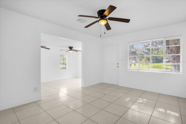 spare room with light tile patterned flooring