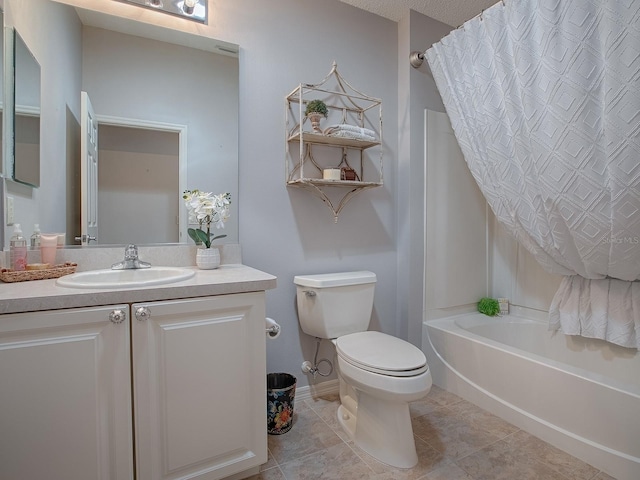 full bathroom with vanity, shower / bath combo, tile patterned floors, and toilet