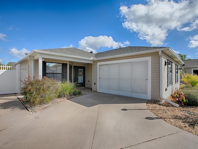 591 Statesburg St, The Villages, FL 32162 - ranch-style house featuring concrete driveway, a garage, and fence