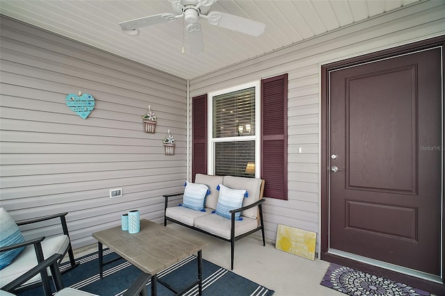 exterior space featuring ceiling fan