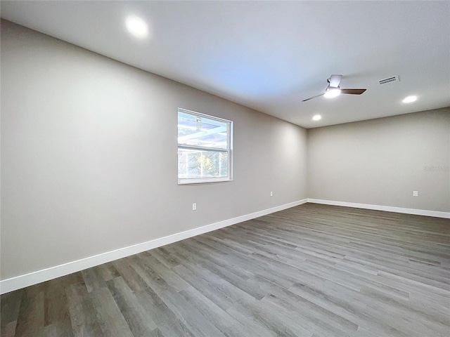 unfurnished room featuring wood-type flooring and ceiling fan