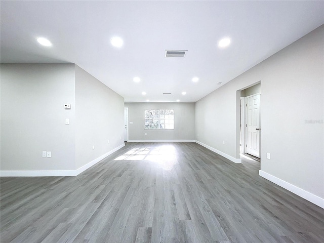 empty room with wood-type flooring