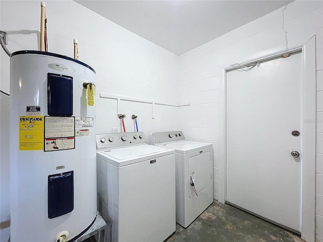 laundry room featuring washer and dryer and electric water heater