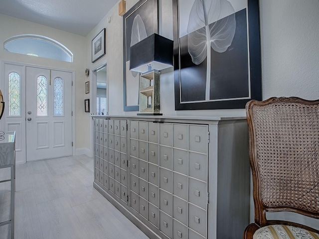 foyer featuring mail area