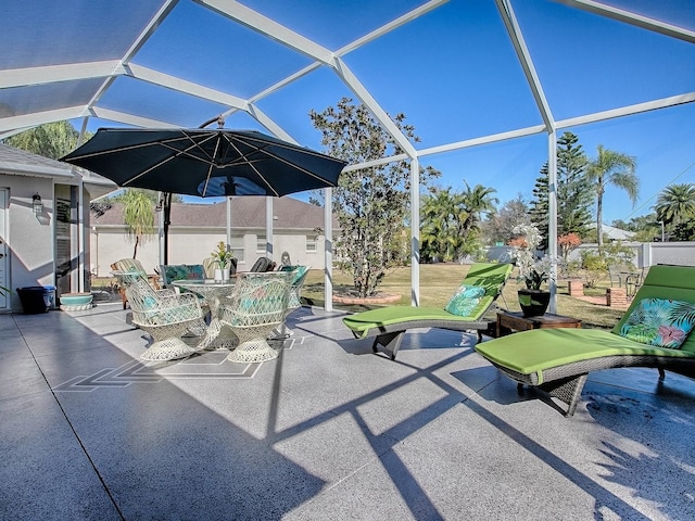 view of patio / terrace with glass enclosure