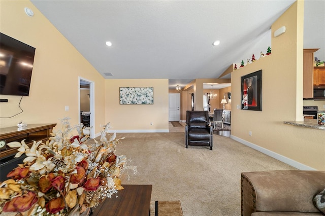 4000 SE 98th Pl, Belleview, FL 34420 - carpeted living area featuring recessed lighting, an inviting chandelier, baseboards, and lofted ceiling