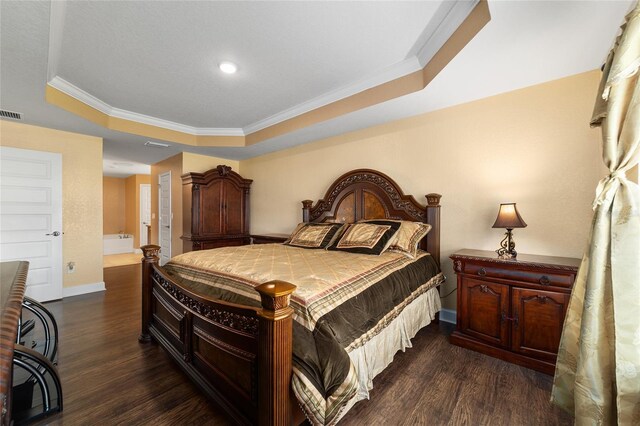 4000 SE 98th Pl, Belleview, FL 34420 - bedroom featuring a raised ceiling, dark wood finished floors, and ornamental molding