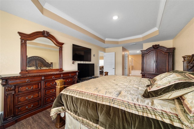 4000 SE 98th Pl, Belleview, FL 34420 - bedroom with a tray ceiling, dark wood-style floors, and crown molding