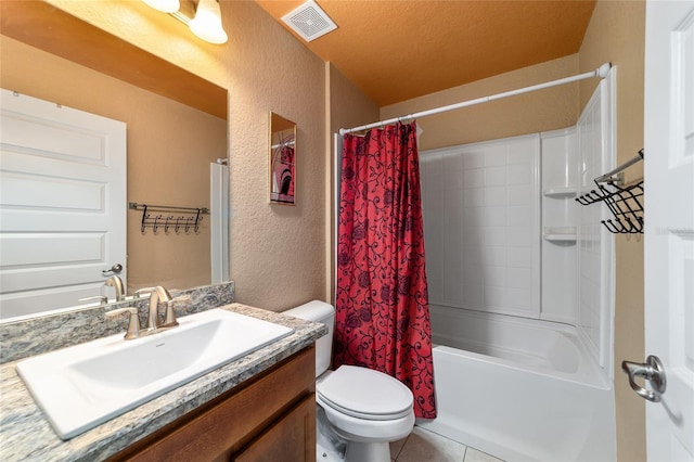 4000 SE 98th Pl, Belleview, FL 34420 - full bath with visible vents, toilet, vanity, and a textured wall