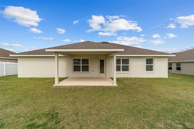 4000 SE 98th Pl, Belleview, FL 34420 - rear view of property with a yard, a patio area, and stucco siding