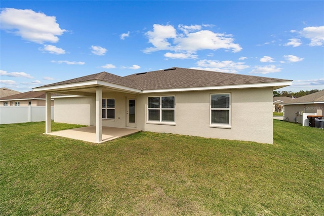 4000 SE 98th Pl, Belleview, FL 34420 - rear view of house featuring a patio, a lawn, fence, and stucco siding