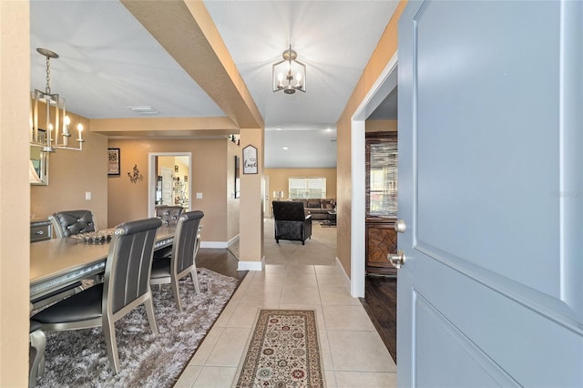 4000 SE 98th Pl, Belleview, FL 34420 - entrance foyer featuring light tile patterned flooring, visible vents, baseboards, and a chandelier