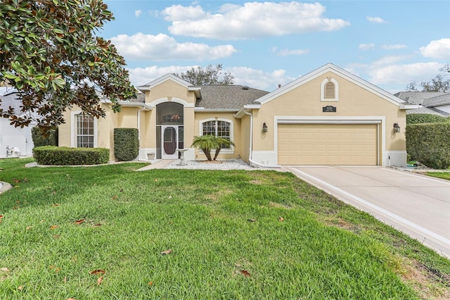 single story home with a shingled roof, concrete driveway, stucco siding, an attached garage, and a front yard