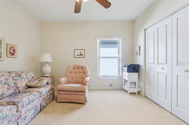 5135 Aurora Dr, Leesburg, FL 34748 - living area with carpet, a ceiling fan, and baseboards