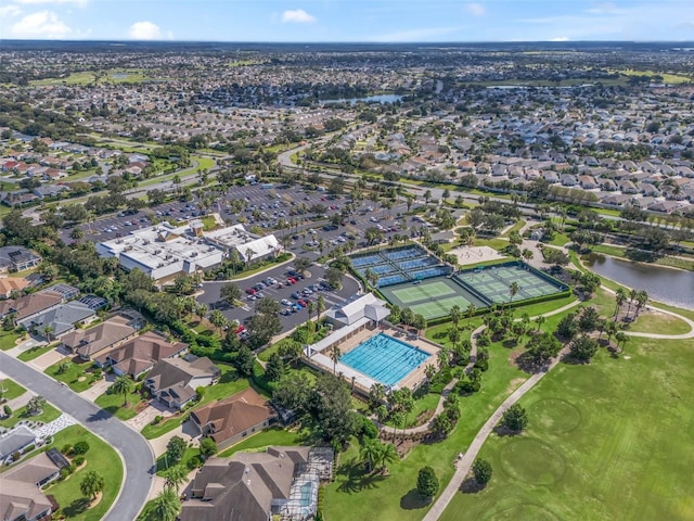 bird's eye view with a residential view and a water view