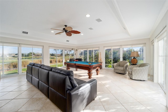 recreation room featuring a tray ceiling, ornamental molding, pool table, and light tile patterned floors