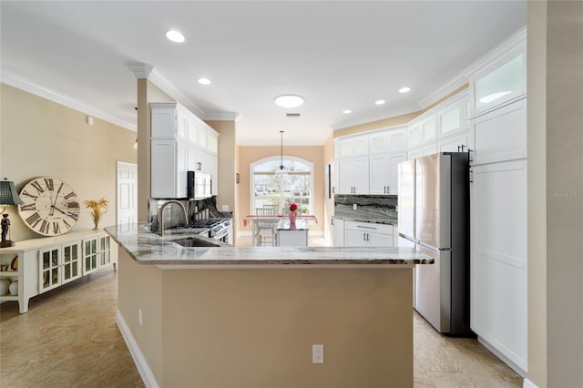 kitchen featuring backsplash, light stone countertops, a peninsula, glass insert cabinets, and appliances with stainless steel finishes