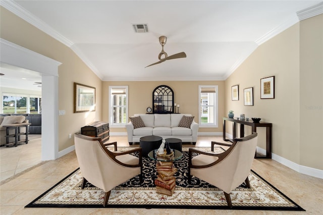 living area featuring light tile patterned floors, ceiling fan, baseboards, ornamental molding, and visible vents