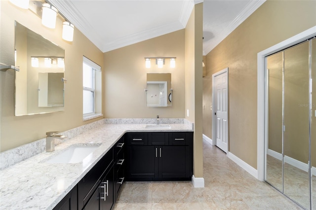 full bathroom with double vanity, lofted ceiling, ornamental molding, and a sink