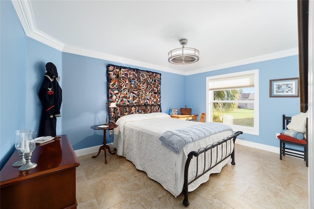 bedroom with baseboards and crown molding