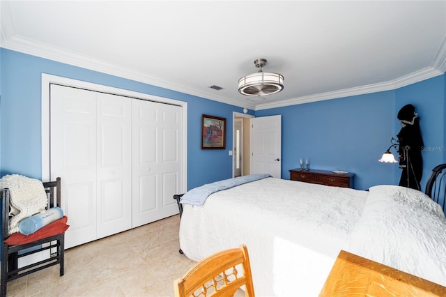 bedroom with visible vents, a closet, and ornamental molding