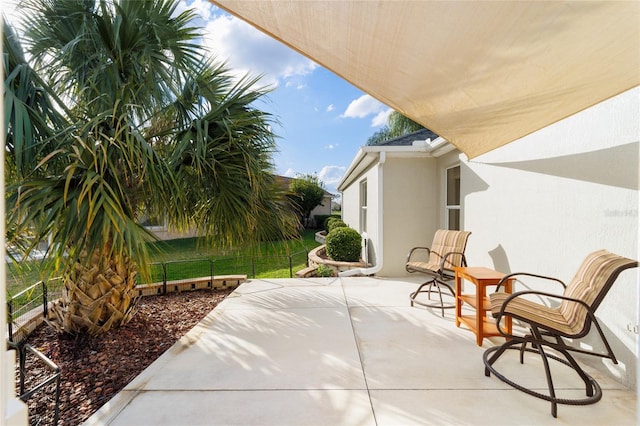 view of patio / terrace with fence