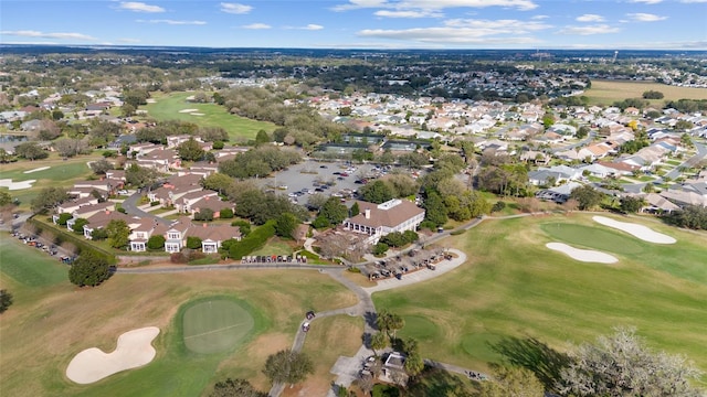 birds eye view of property featuring golf course view and a residential view