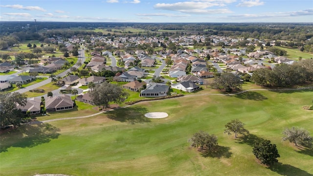 birds eye view of property featuring golf course view and a residential view