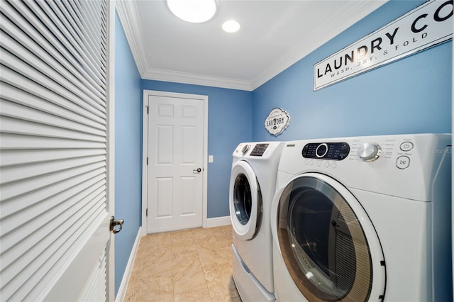 washroom with separate washer and dryer, baseboards, laundry area, and crown molding