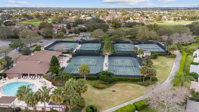 aerial view featuring view of golf course and a residential view