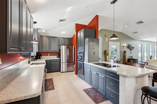 kitchen featuring appliances with stainless steel finishes, gray cabinets, and sink