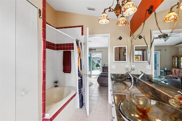 bathroom with tile patterned floors, vanity, and shower / tub combo