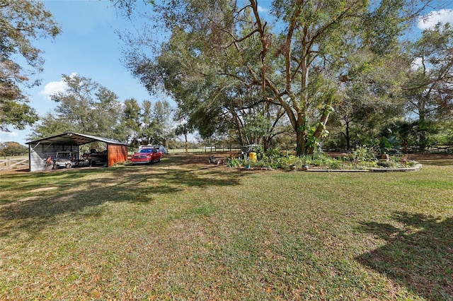 view of yard with a carport