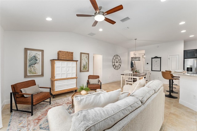 living area featuring vaulted ceiling, a ceiling fan, visible vents, and recessed lighting