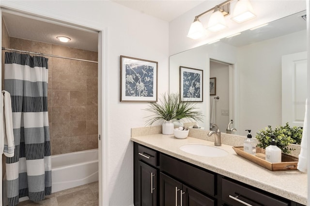 full bathroom with tile patterned floors, vanity, and shower / bath combo with shower curtain